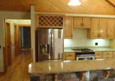 Spacious rustic kitchen with wooden accents
