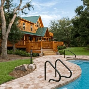 Madison Luxury Log Home Back Porch | Georgia Cypress Log Homes Builder