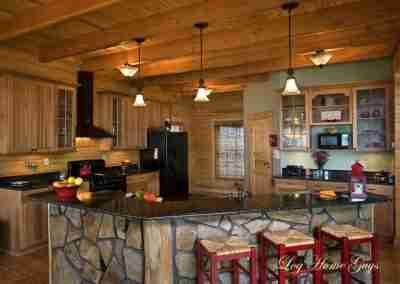 Modern rustic kitchen with wooden elements and island.