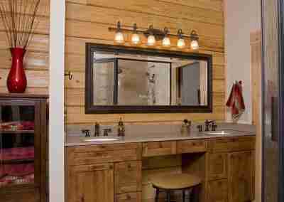 Rustic bathroom with wooden accents and mirror
