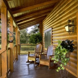 Modified Manatee Cypress Log Home Covered Porch View by Log Home Guys of Florida
