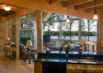Cozy log cabin interior with lake views