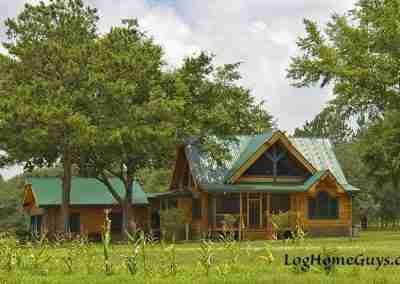 Charming log cabin surrounded by lush greenery