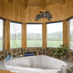 Siverado Log Home floor-plan architectural bump-out features a wonderful garden tub ready for true relaxation.